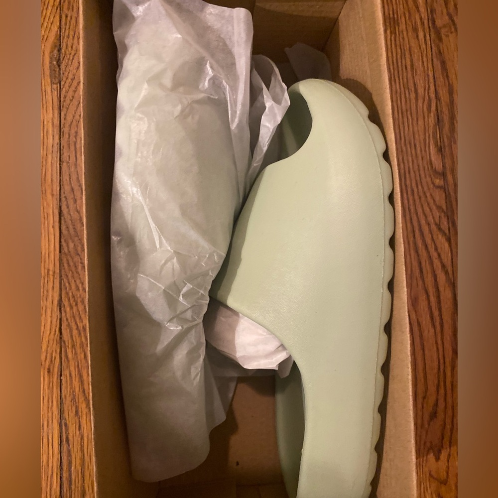Women’s mint colored slides